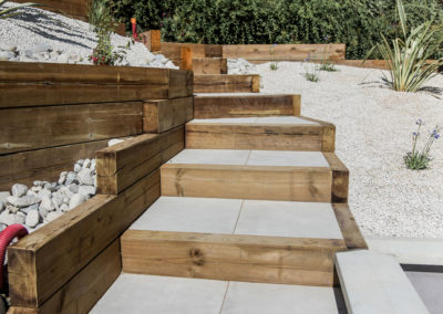 Création d’escaliers, d’une terrasse et d’un massif minéral – POLLIONNAY